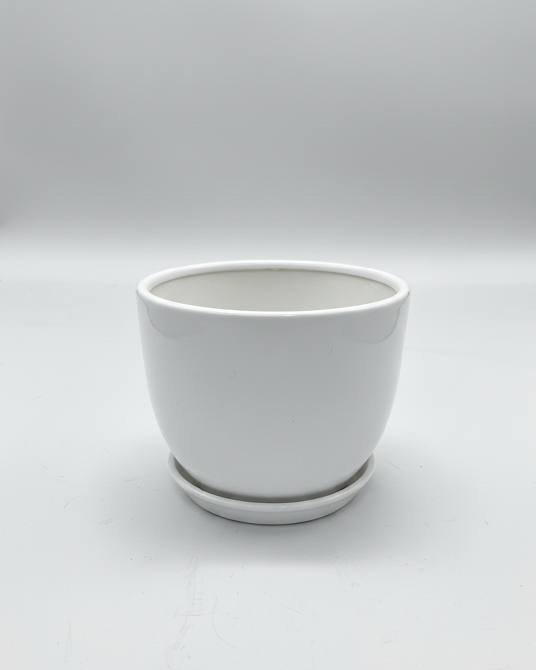 Ceramic Pot With Attached Saucer